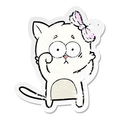 distressed sticker of a cartoon cat