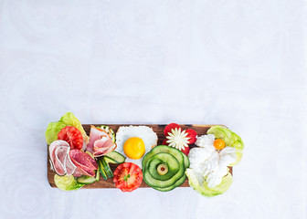 Breakfast on wooden platter