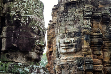 Smiling Faces of Bayon temple in Angkor Thom ancient ruin near Angkor Wat, Siem Reap, Cambodia ..One of the most magnificent lost civilization in the world.