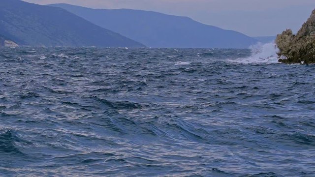 Beautiful seascape of the waves motion in Brestova coast. Croatia. Flat plane. Slow motion