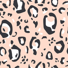 Seamless pattern with animal print. Trendy abstract texture with leopard skin. Fashion vector illustration.