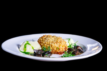 Pozharskaya (chicken) cutlet with mashed potatoes and mushrooms.