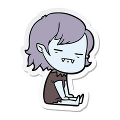 sticker of a cartoon undead vampire girl sitting