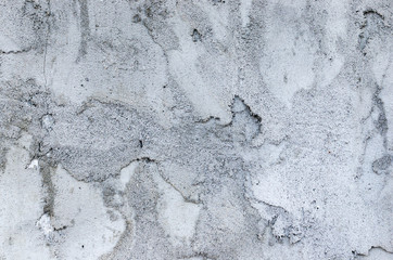 Background of gray casually superimposed concrete.