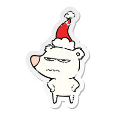 angry bear polar distressed sticker cartoon of a wearing santa hat