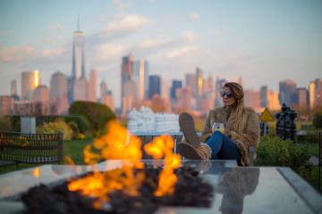 views of manhattan having a drink under fire