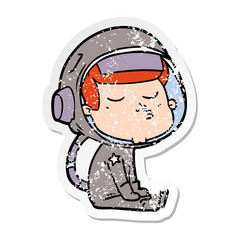 distressed sticker of a cartoon confident astronaut