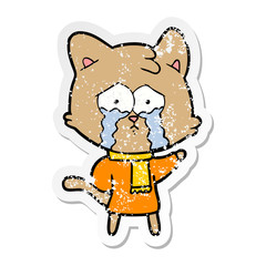 distressed sticker of a cartoon crying cat
