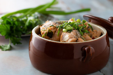 fish stew in tomatoes and herbs