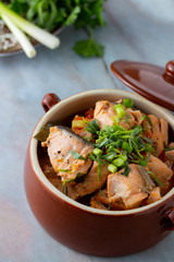 Fish stew in tomatoes and herbs