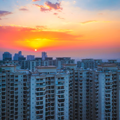 Fototapeta na wymiar early morning sunrise in the city asia. high rise building 