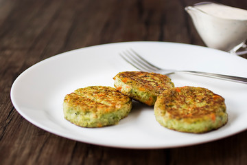 Vegetable patties on a white plate. Vegetarian food.