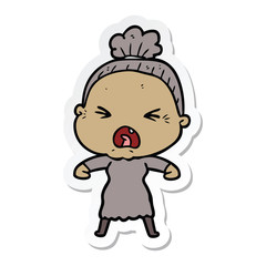 Obraz premium sticker of a cartoon angry old woman