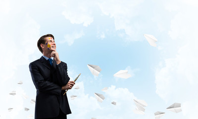 Inspiration of young creative businessman