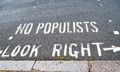Road text that has been supplemented with a warning against populism, which is spreading more and more around the world.