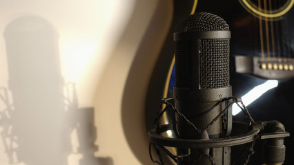 electric guitar and studio microphone 
