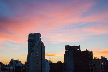 Fototapeta na wymiar Sunset over the Rosario city buildings