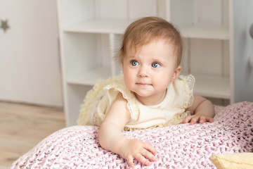 little girl crawling on the floor