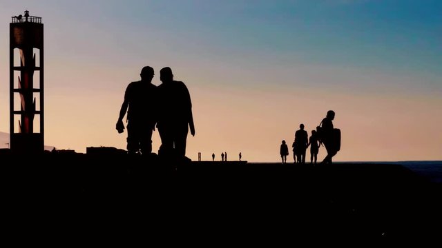 People Walking In Evening