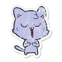 distressed sticker of a cartoon cat singing