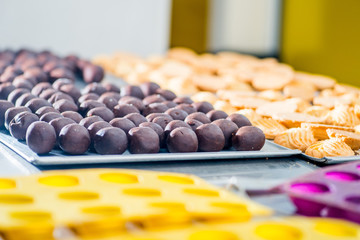 chocolate balls of dough, ready to bake