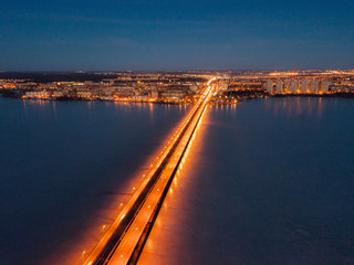 Fototapeta na wymiar Evening winter Voronezh, Northern bridge, aerial view