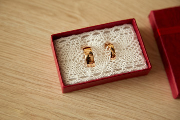 Gold wedding rings in red box