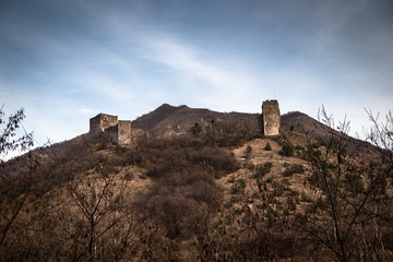 Ruins of medieval castle on top of hill near the river and road. Maglic in Serbia.