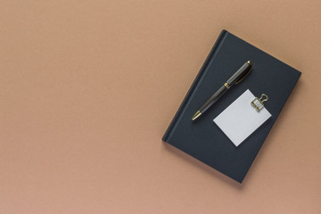 notepad notes pen beige  top view with copy space for your text. flat lay. 