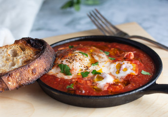 shakshuka, baked eggs