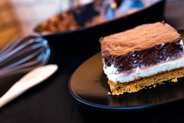 Delicious cake composed of three chocolates.