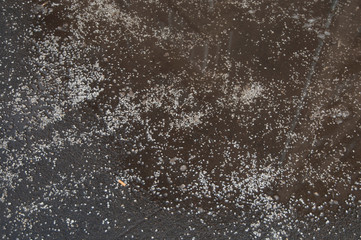 Deicing chemicals on asphalt road