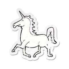 retro distressed sticker of a cartoon unicorn