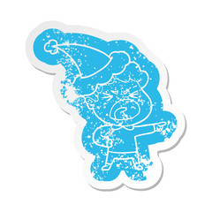cartoon distressed sticker of a furious man wearing santa hat