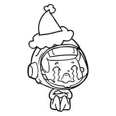 line drawing of a crying astronaut wearing santa hat
