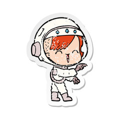 distressed sticker of a cartoon astronaut girl pointing and laughing