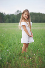 Fototapeta premium happy little girl with long hair