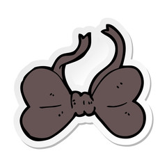 sticker of a cartoon bow tie