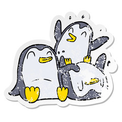 distressed sticker of a cartoon penguins