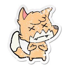 distressed sticker of a cartoon cross eyed fox