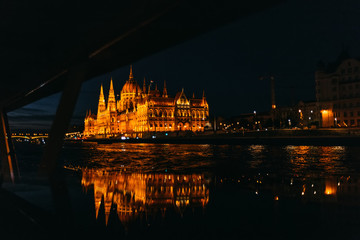 Fototapeta na wymiar Budapest Parliament in Hungary at night on the Danube river. vie