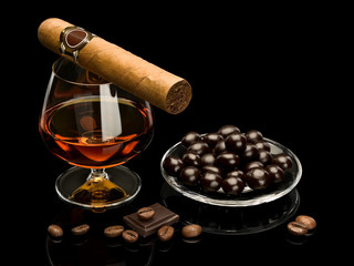 Cognac, cigar and chocolate covered coffee beans