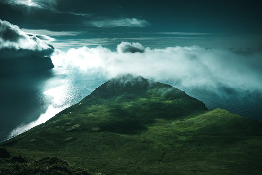 Hjornbarg cliff in moonlight, Iceland