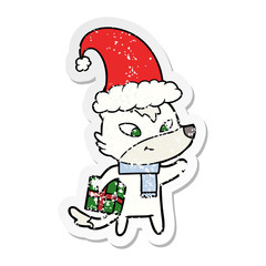 distressed sticker of a friendly cartoon christmas wolf