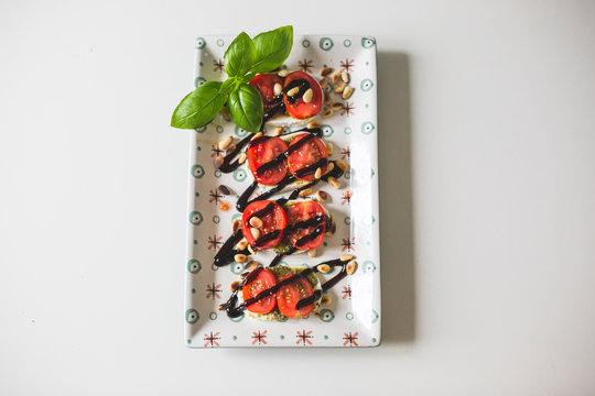 Caprese salad with pine nuts