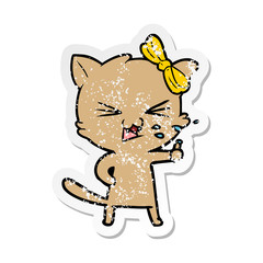distressed sticker of a cartoon cat