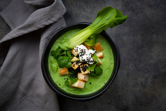 Green Thai curry with spinach, bok choy, tofu, sour cream, black sesame and rice