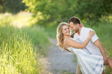 Fototapeta premium Beautiful young couple happily engaged