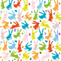 Seamless pattern with cartoon colorful bright rabbits and easter eggs. Animal pattern. Easter bunnies vector background.