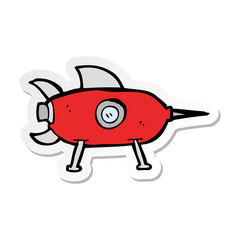 sticker of a cartooon space rocket